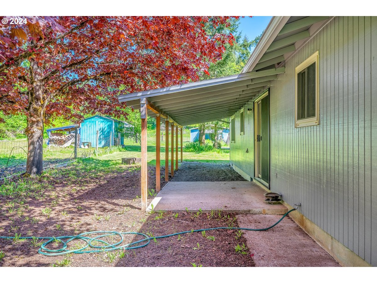 69711 Marcott Road Rainier, OR 97048 - Photo 13 of 18 a view of a backyard with garden