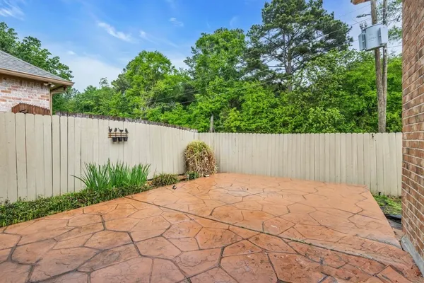 a backyard of a house with lots of green space