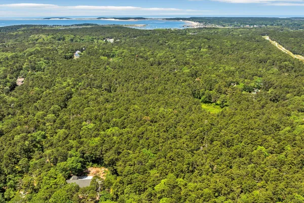 a view of a field with an outdoor space