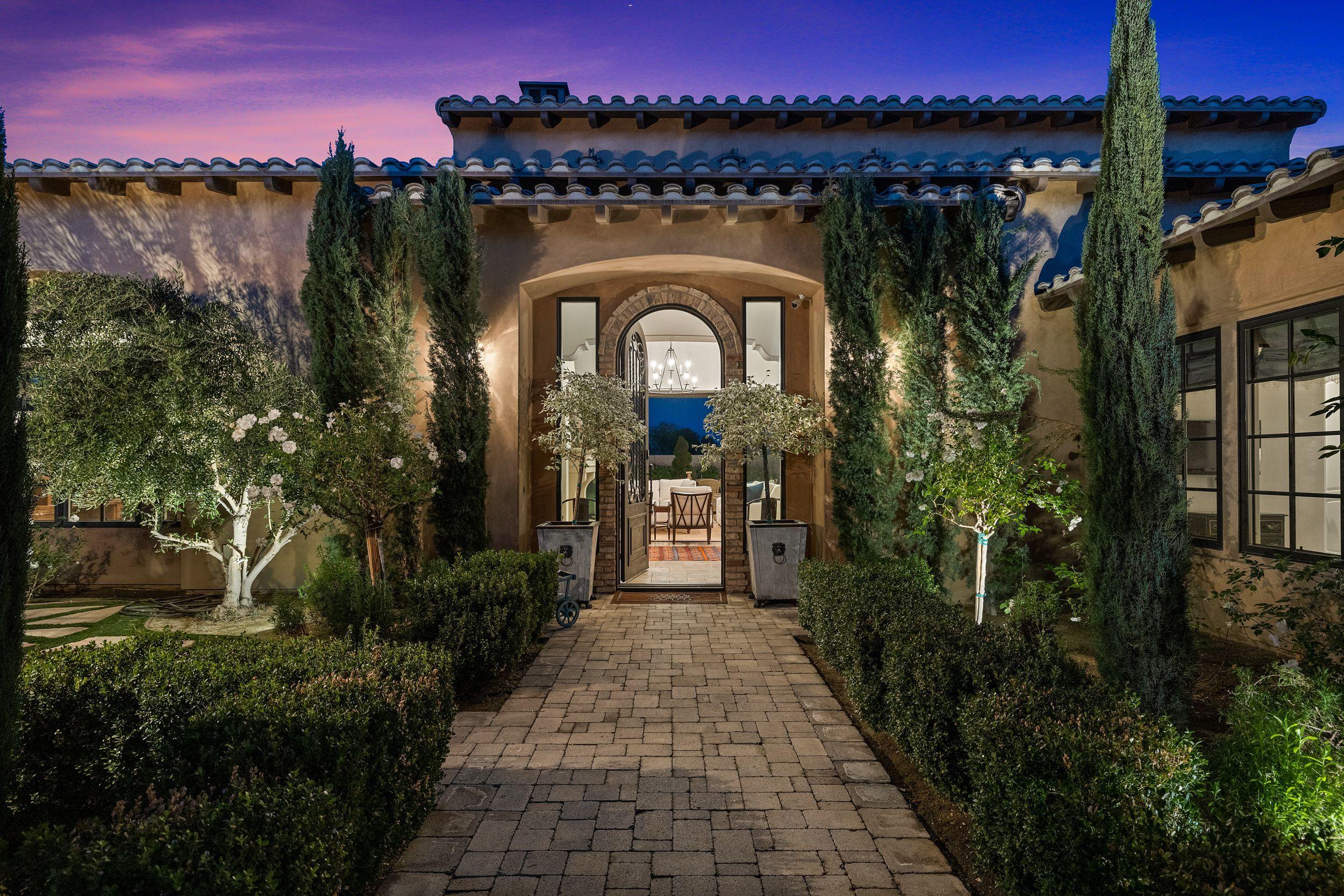 54360 Alysheba Drive La Quinta, CA 92253 - Photo 2 of 24 a front view of a house