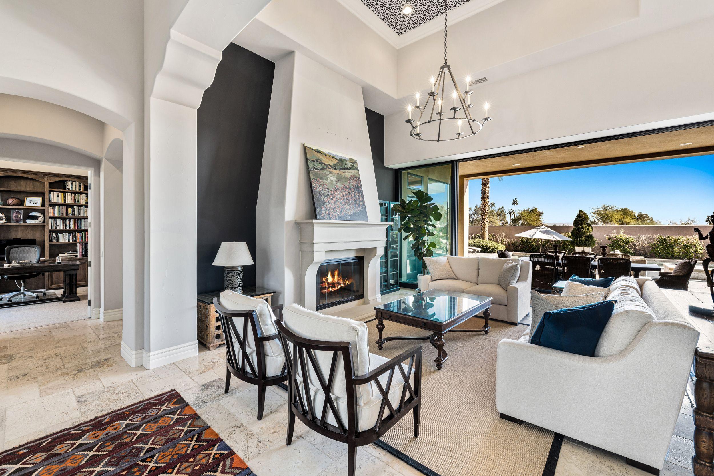 54360 Alysheba Drive La Quinta, CA 92253 - Photo 3 of 24 a view of a livingroom and dining room