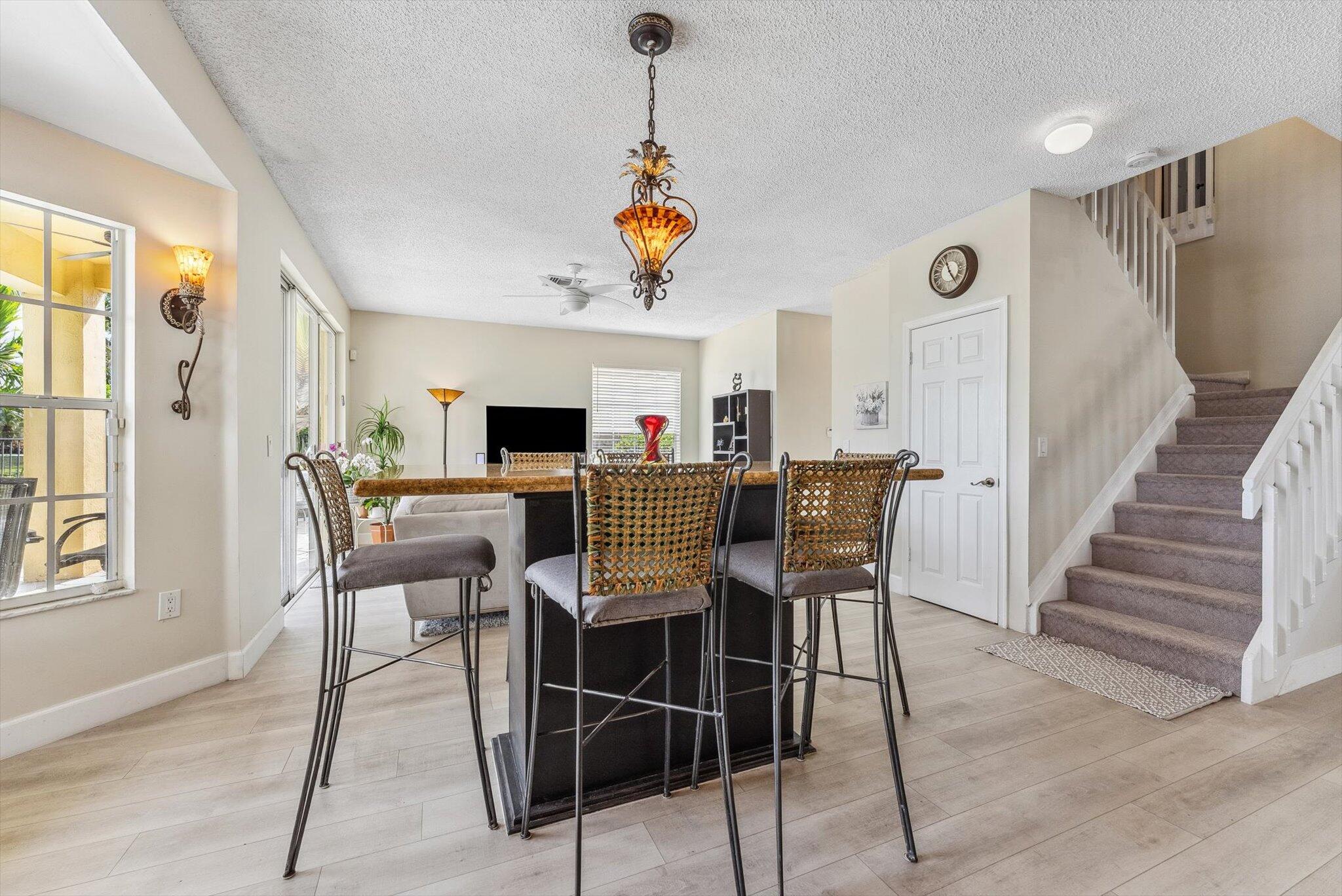 640 Culpepper Terrace Davie, FL 33325 - Photo 17 of 68 a dining room with furniture window and wooden floor