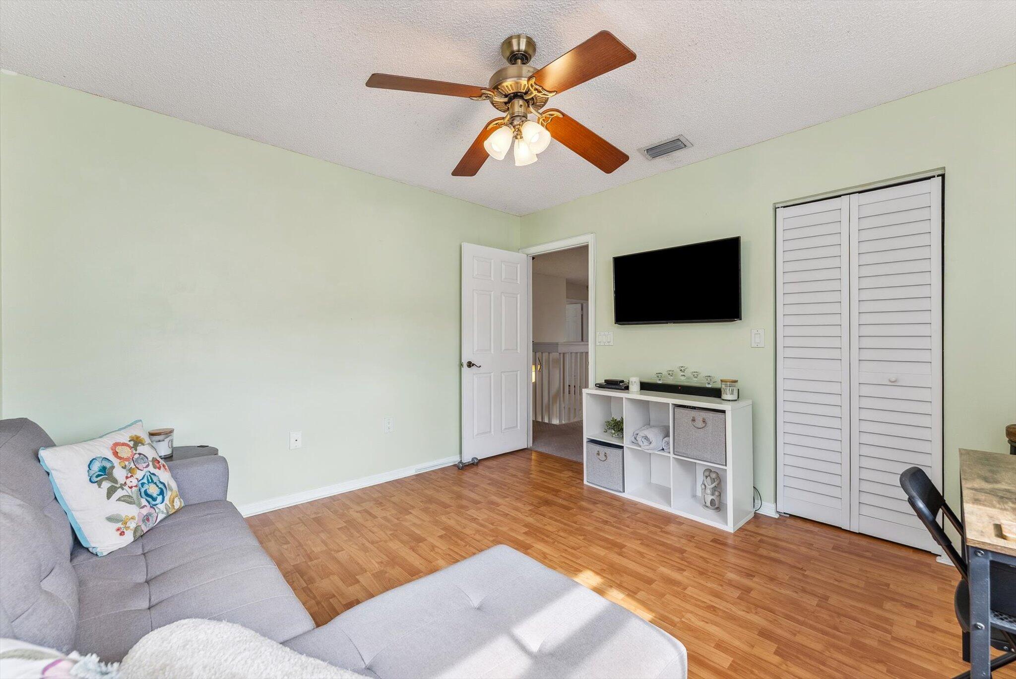 640 Culpepper Terrace Davie, FL 33325 - Photo 47 of 68 a bedroom with a bed and a flat screen tv