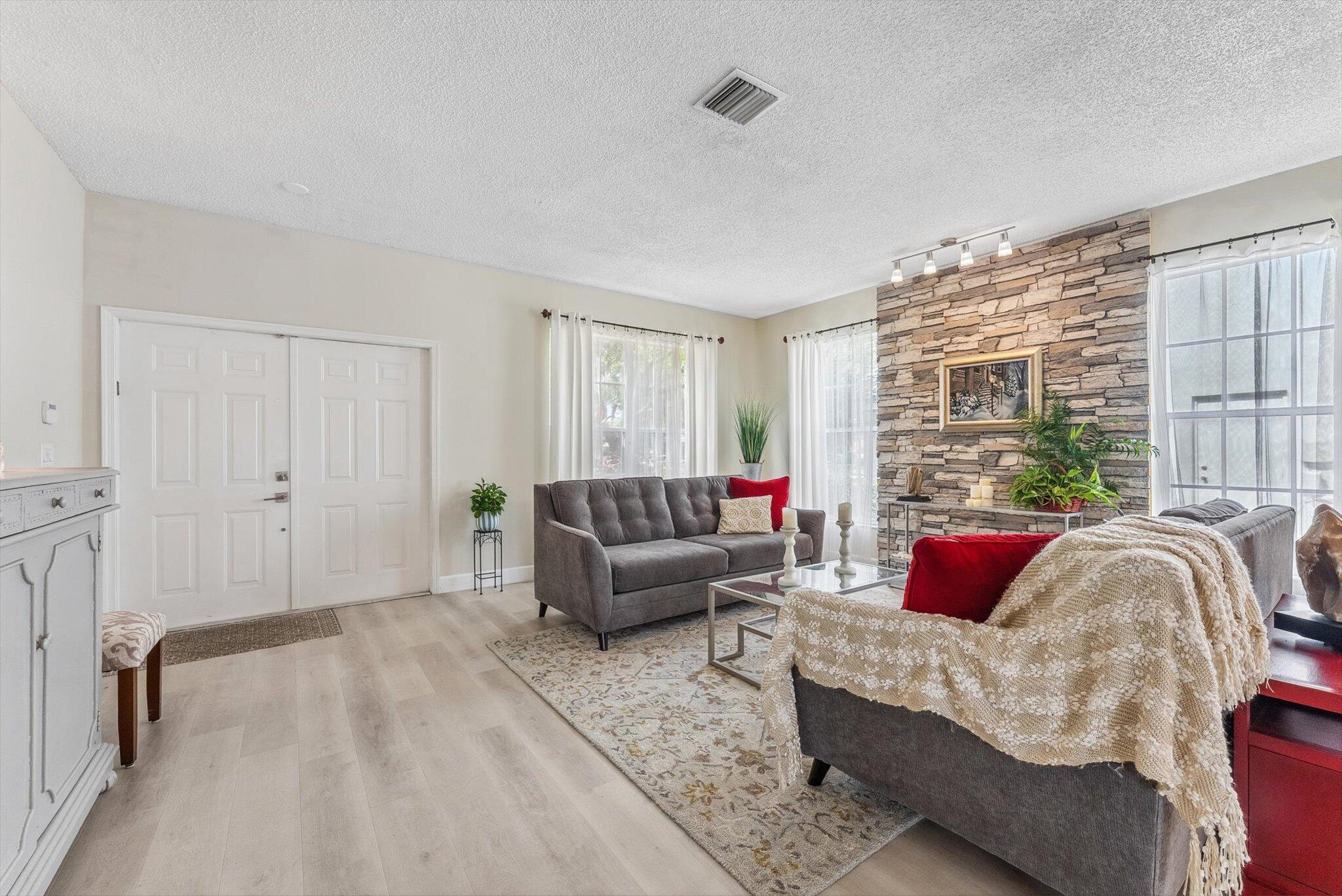 640 Culpepper Terrace Davie, FL 33325 - Photo 5 of 68 a living room with furniture and a large window