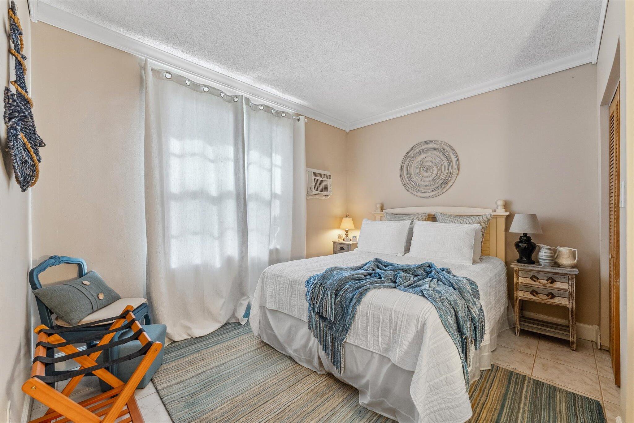 640 Culpepper Terrace Davie, FL 33325 - Photo 51 of 68 a bedroom with a bed and a window