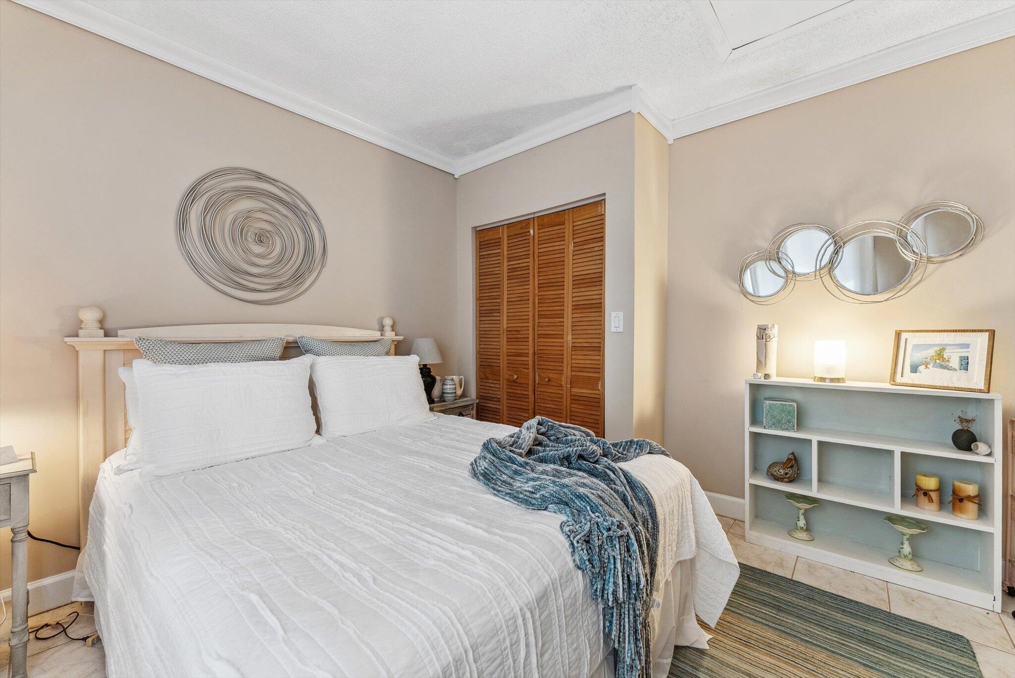 640 Culpepper Terrace Davie, FL 33325 - Photo 52 of 68 a bedroom with a bed and a window