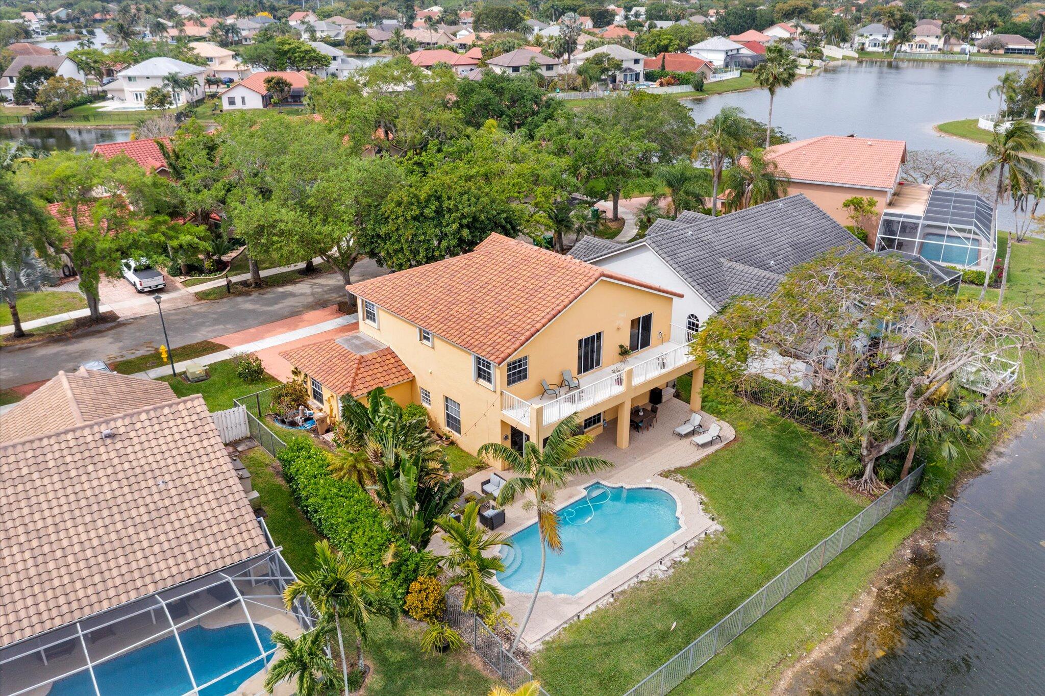 640 Culpepper Terrace Davie, FL 33325 - Photo 54 of 68 an aerial view of a house with a garden