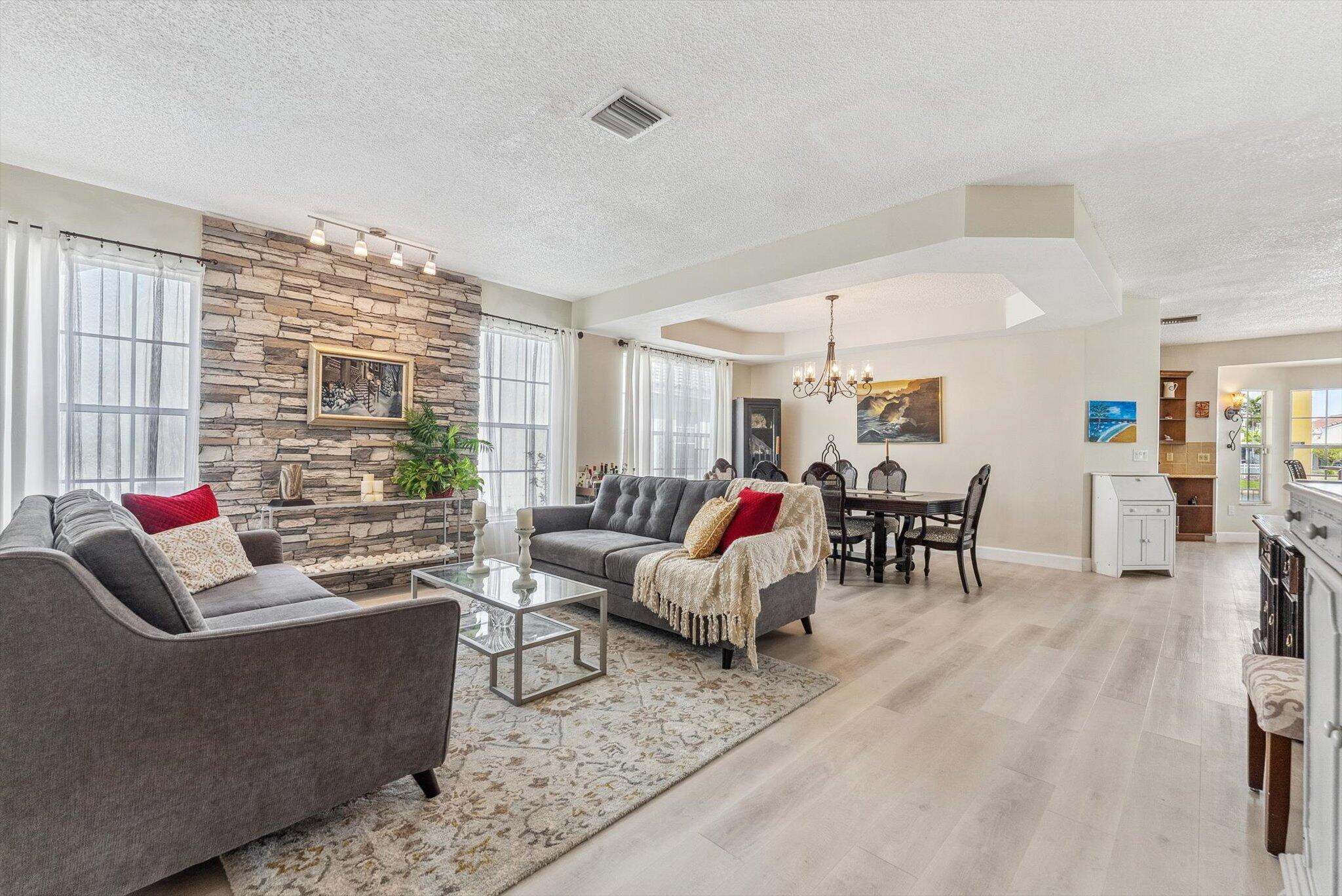 640 Culpepper Terrace Davie, FL 33325 - Photo 6 of 68 a living room with furniture and a flat screen tv