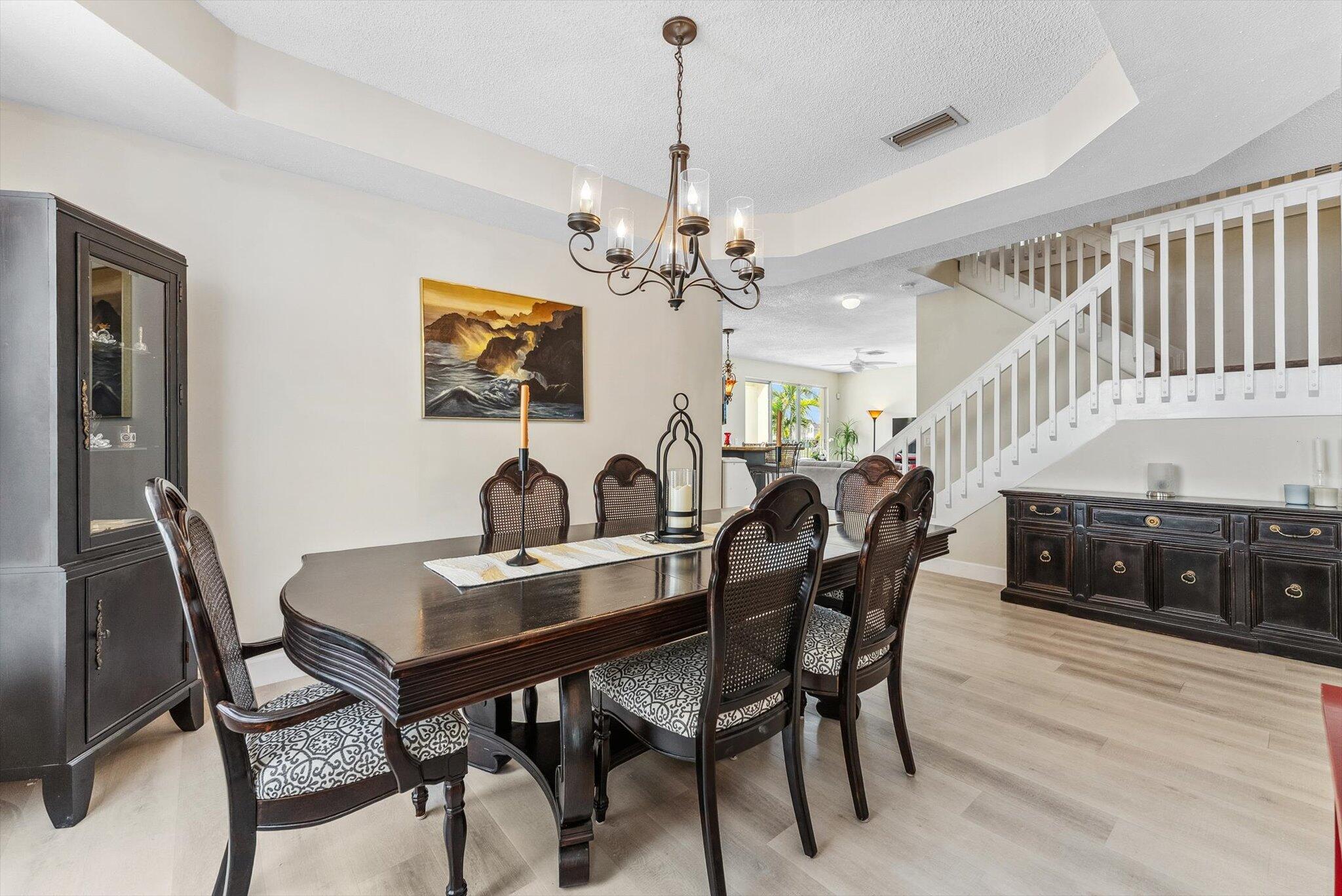 640 Culpepper Terrace Davie, FL 33325 - Photo 10 of 68 a view of a dining room with furniture and wooden floor