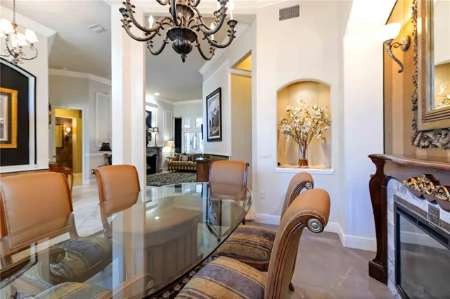 a kitchen with stainless steel appliances granite countertop a stove and a refrigerator