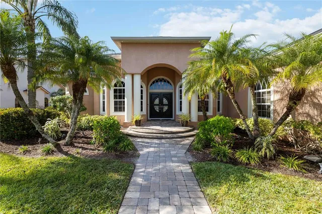 a view of a house with a garden
