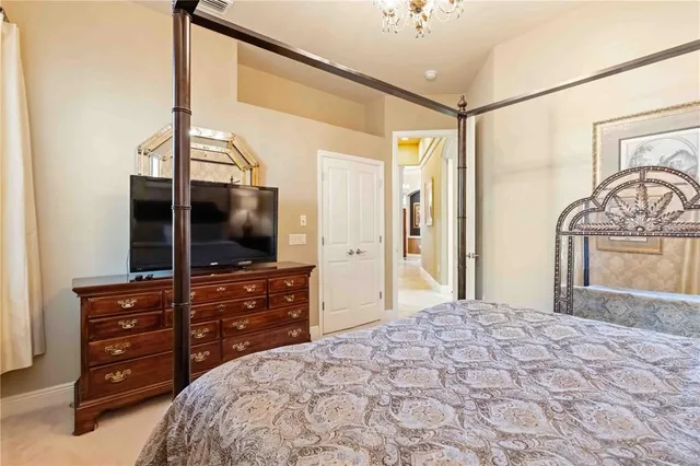 a bed room with a bed and a window