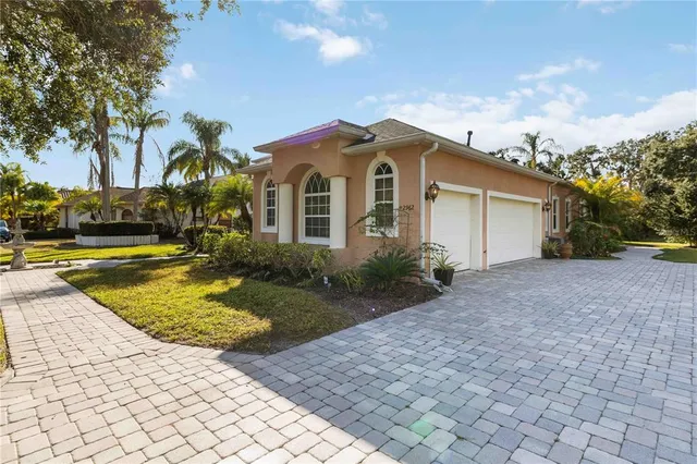 a living room with furniture a dining table and a large window
