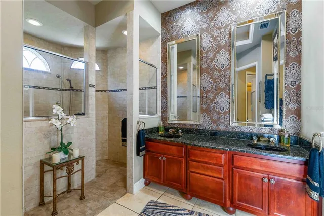 a view of a backyard with sitting area and furniture