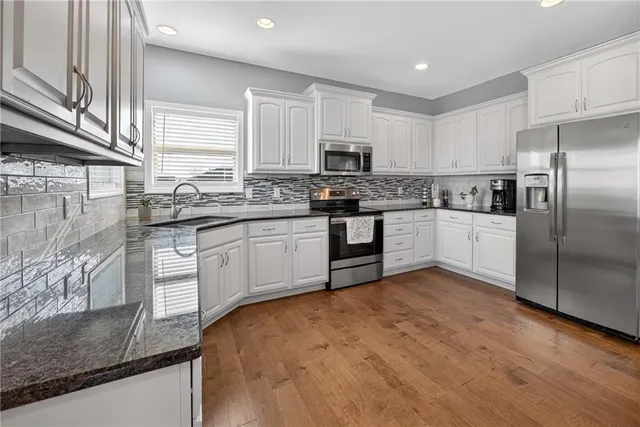 $450,000 | 1325 North 160th Terrace, Basehor, KS 66007