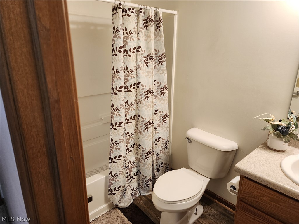 176 Overhill Road Youngstown, OH 44512 - Photo 15 of 20 Full bathroom upstairs featuring toilet, vanity, and shower / tub combo with curtain