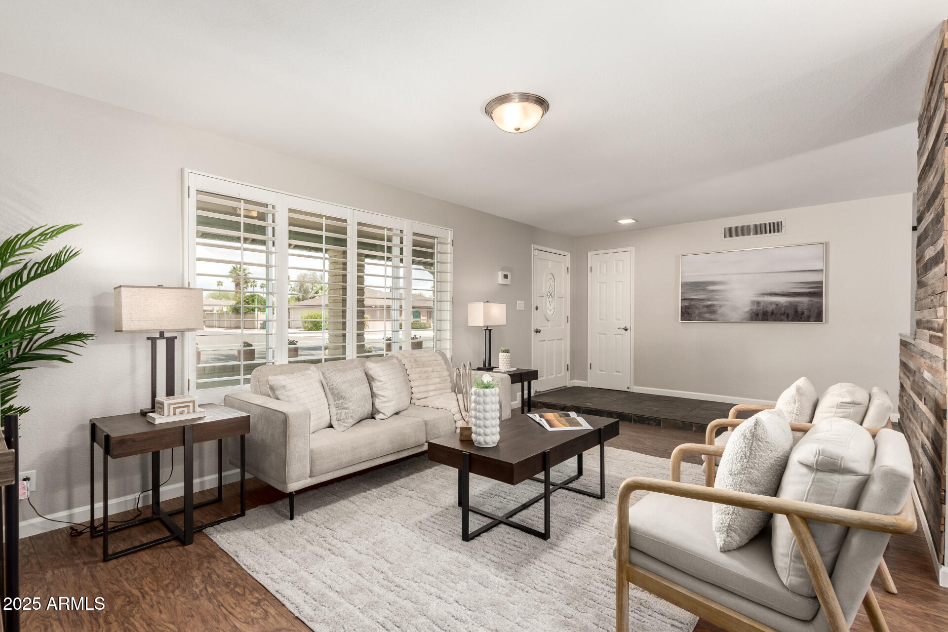 1237 East Gemini Drive Tempe, AZ 85283 - Photo 10 of 51 a living room with furniture and a large window