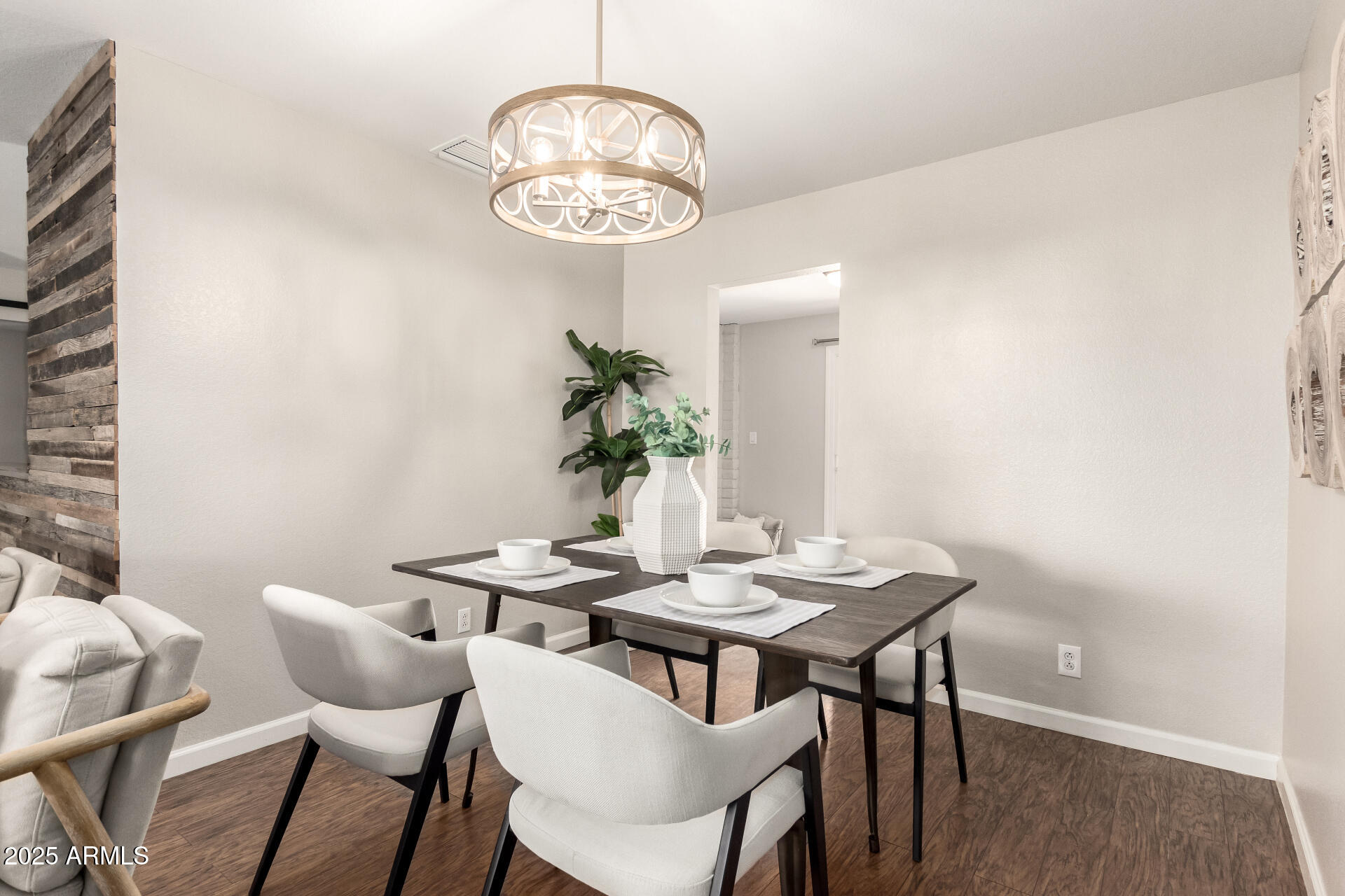 1237 East Gemini Drive Tempe, AZ 85283 - Photo 11 of 51 a view of a dining room with furniture and wooden floor