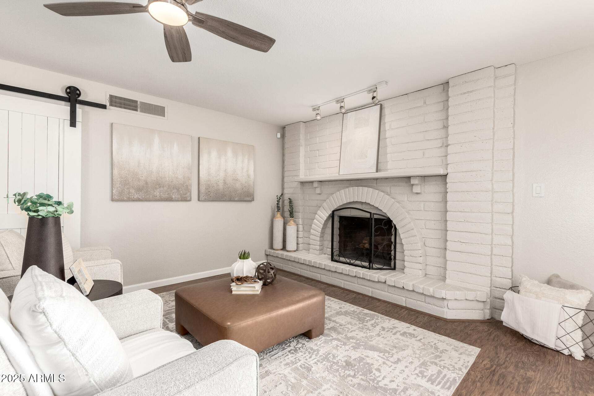 1237 East Gemini Drive Tempe, AZ 85283 - Photo 14 of 51 a living room with furniture and a fireplace