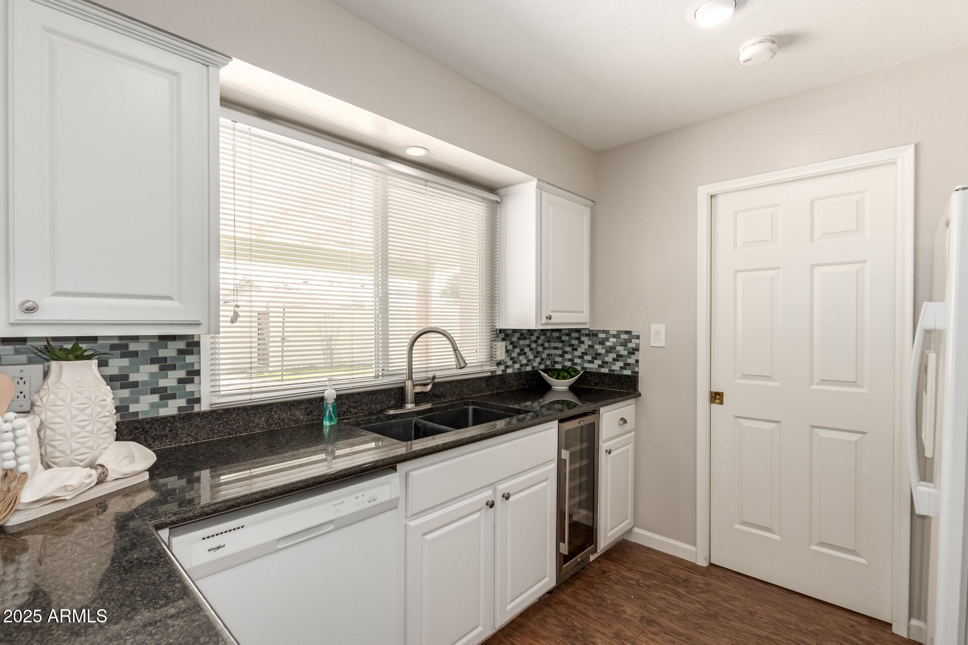 1237 East Gemini Drive Tempe, AZ 85283 - Photo 19 of 51 a kitchen with a sink and cabinets