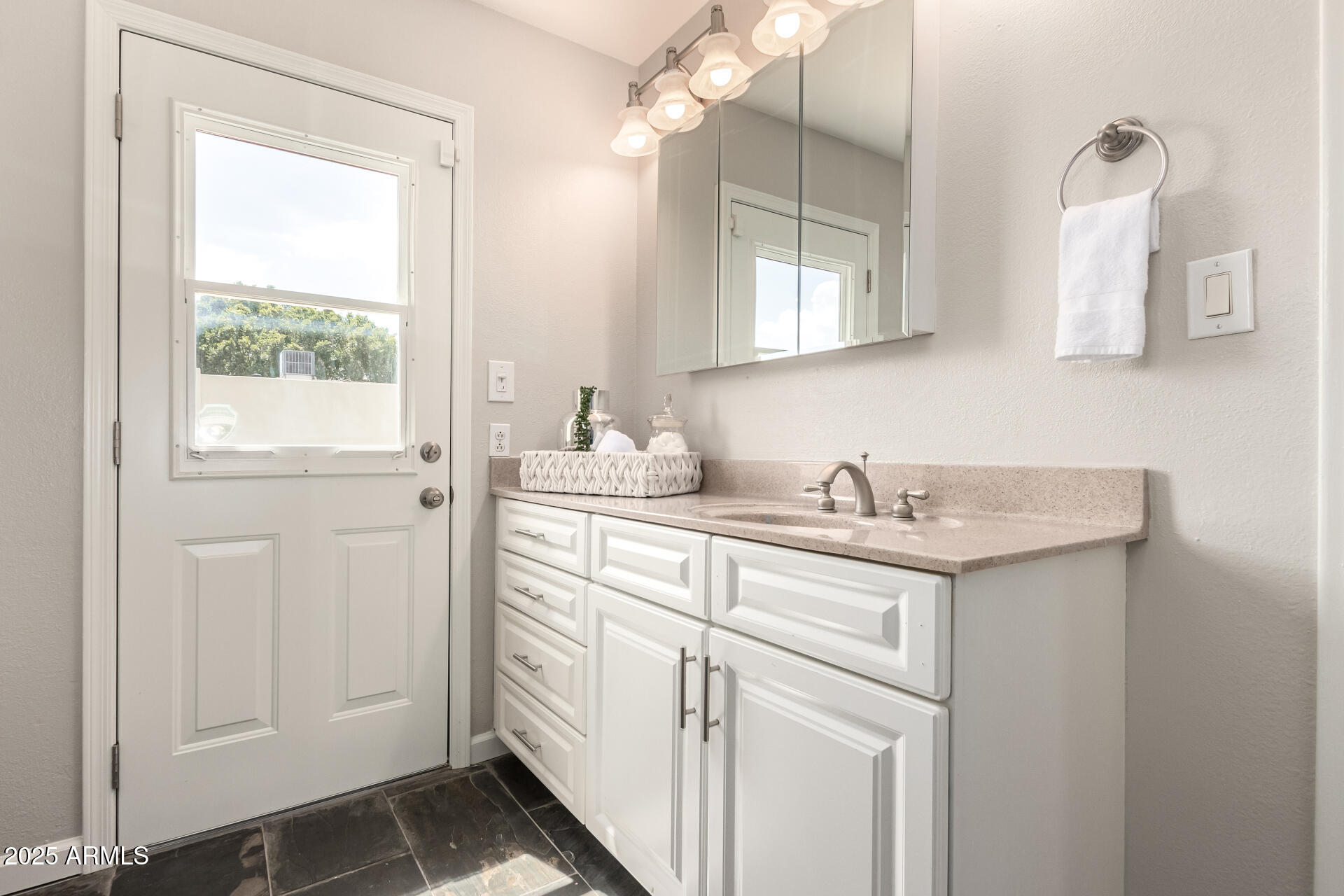 1237 East Gemini Drive Tempe, AZ 85283 - Photo 27 of 51 a kitchen with a sink cabinets and window