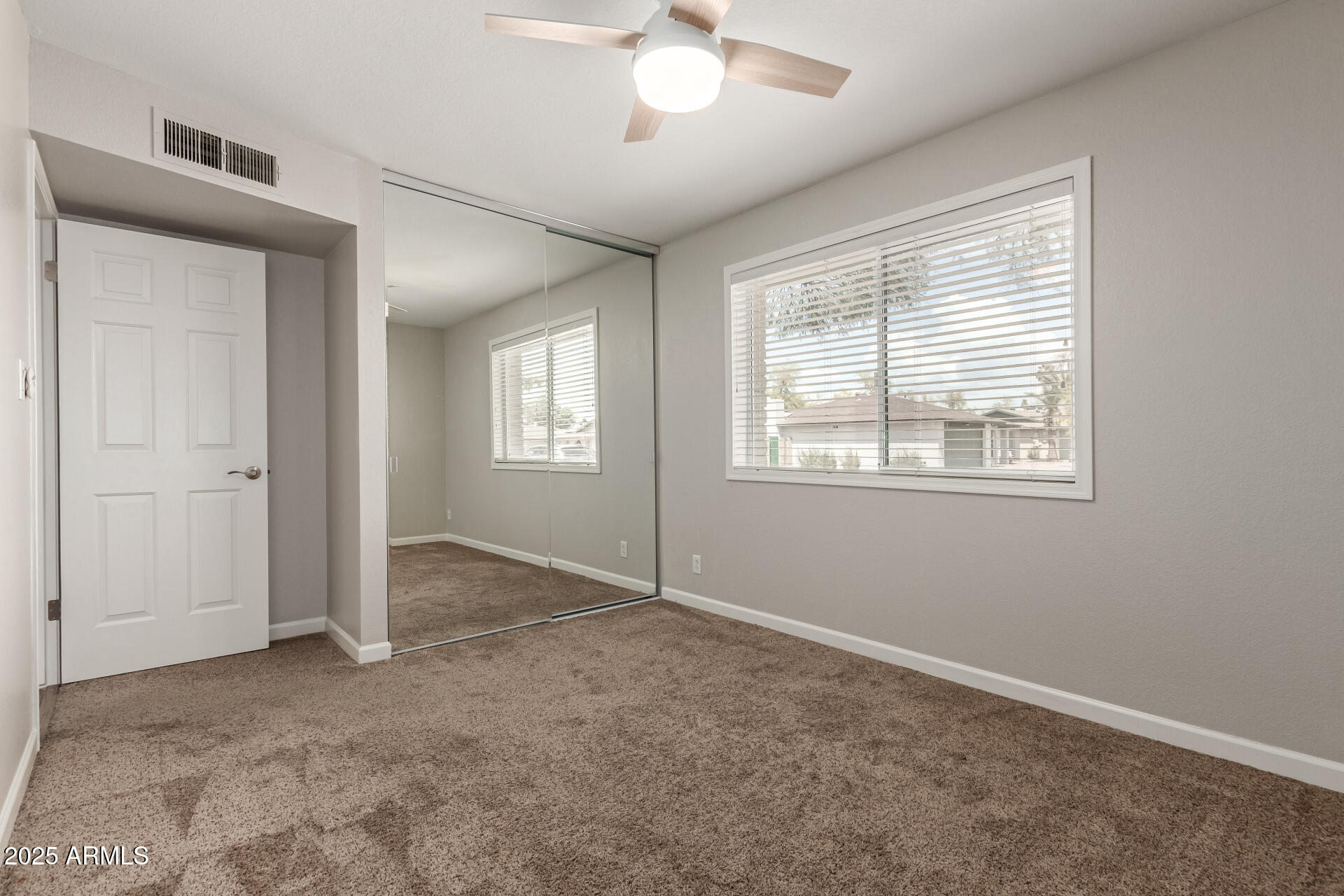 1237 East Gemini Drive Tempe, AZ 85283 - Photo 32 of 51 a view of an empty room with a window