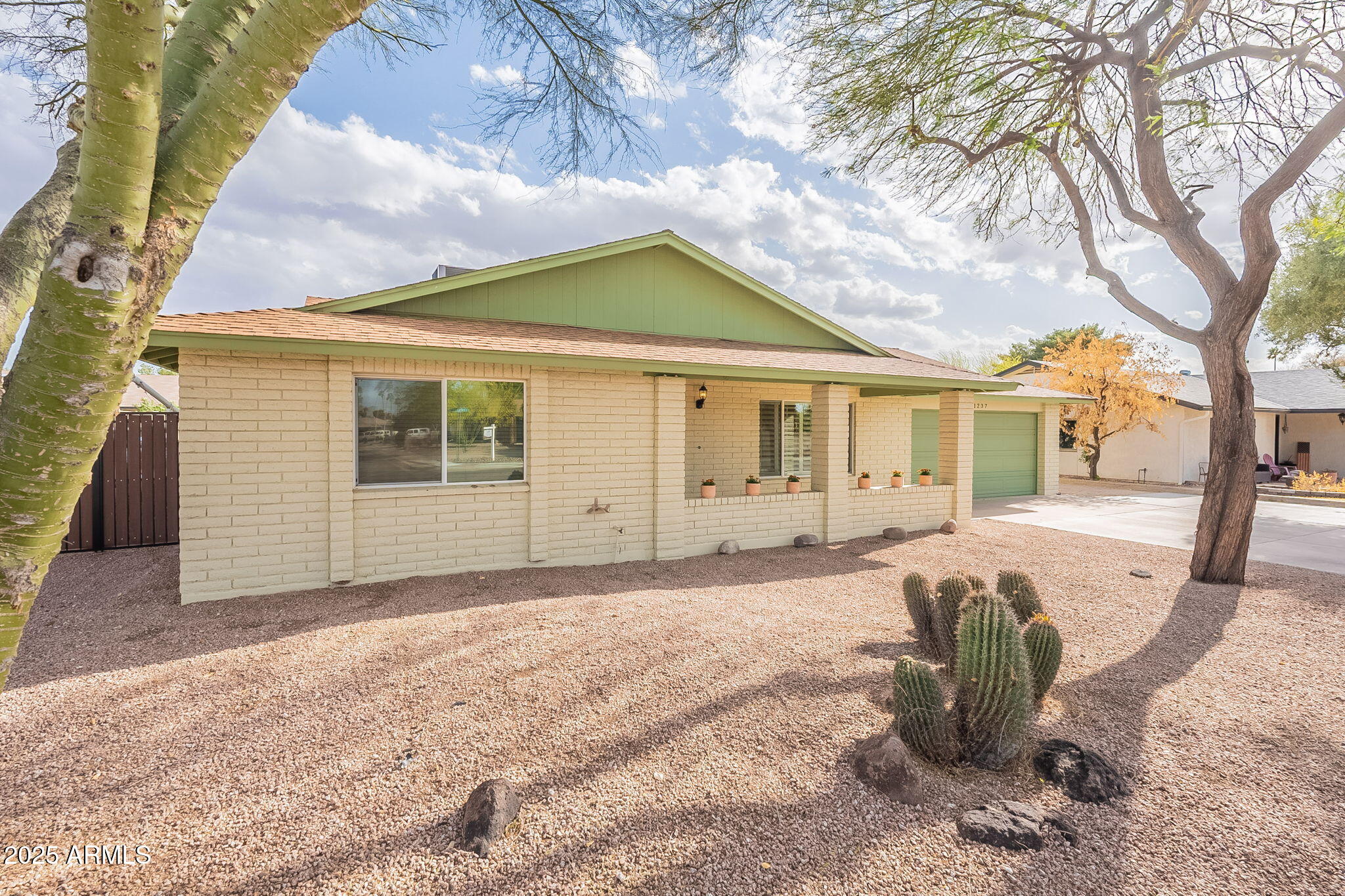 1237 East Gemini Drive Tempe, AZ 85283 - Photo 3 of 51 a view of a house with backyard and a tree
