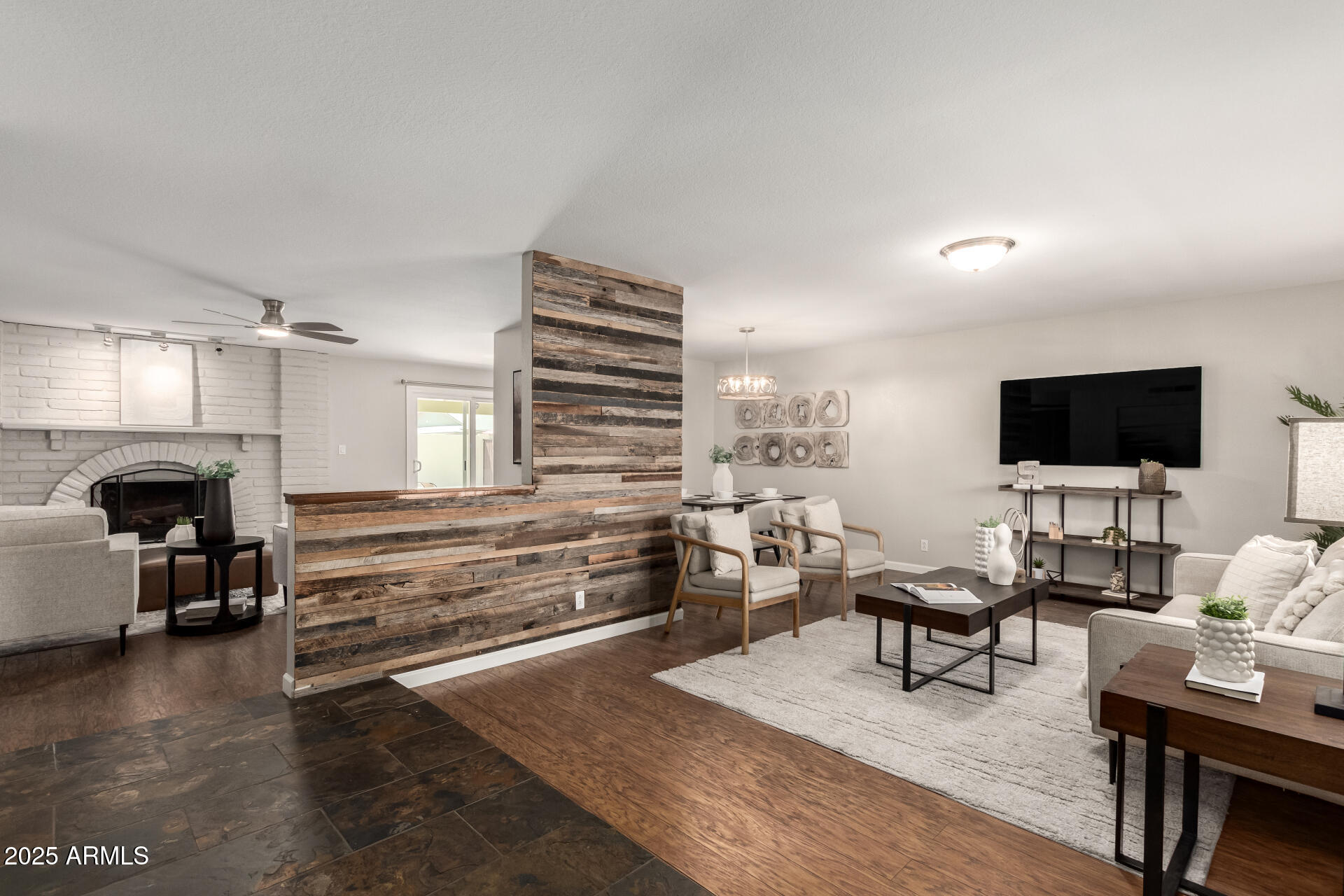 1237 East Gemini Drive Tempe, AZ 85283 - Photo 5 of 51 a living room with furniture and a flat screen tv