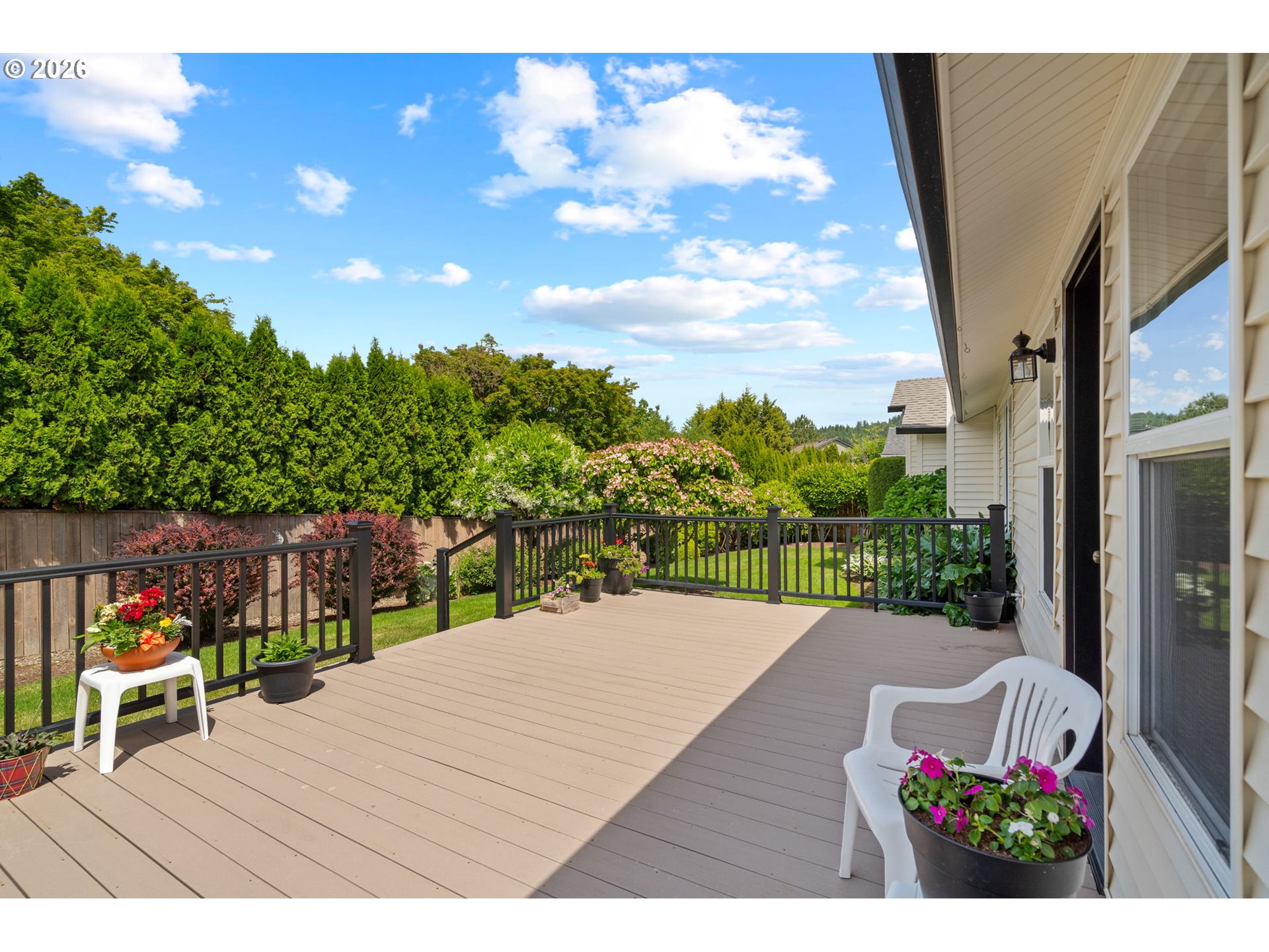 3081 Southwest 31st Street Gresham, OR 97080 - Photo 33 of 38 a view of a patio with table and chairs and potted plants