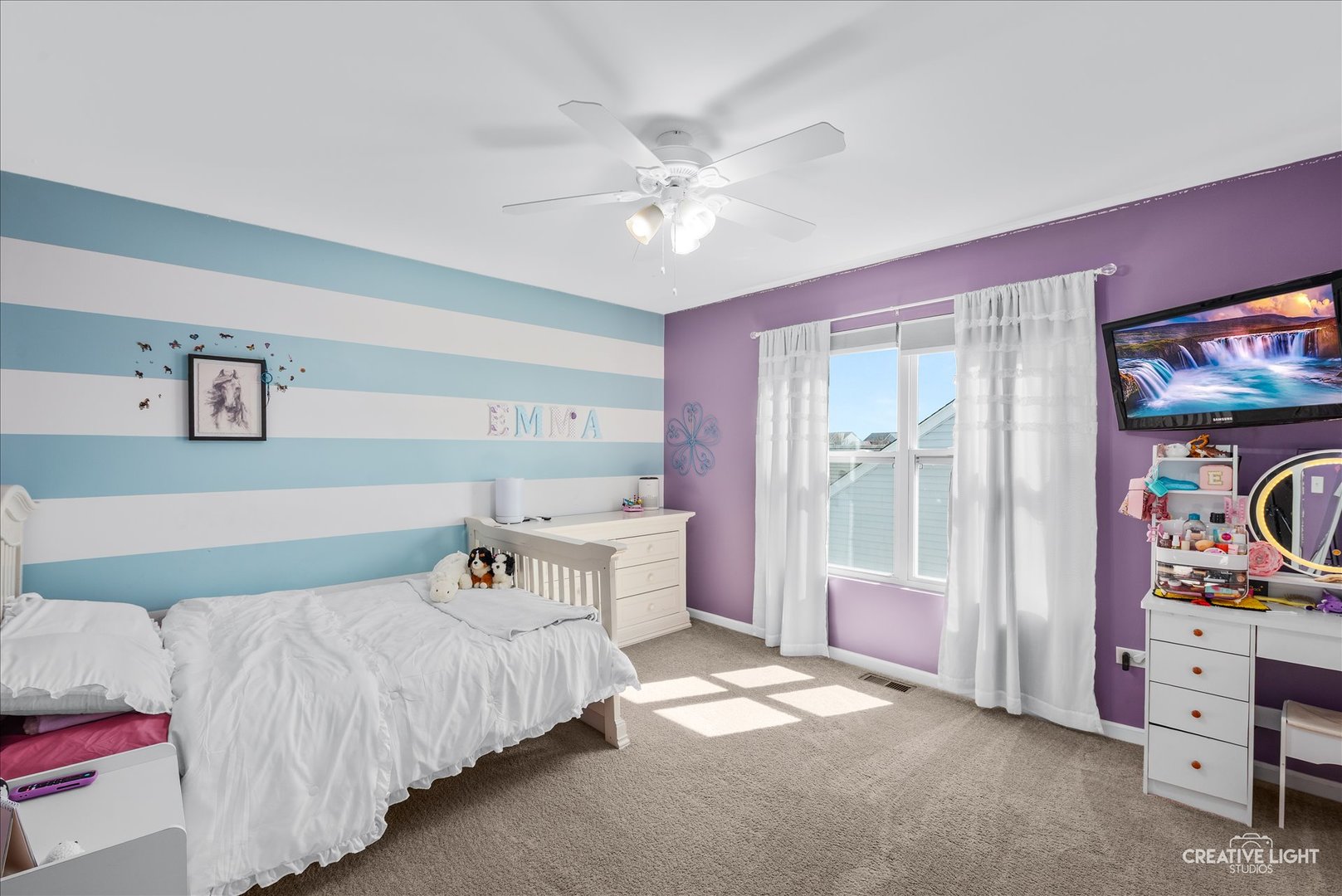 1615 Seward Road Joliet, IL 60431 - Photo 15 of 31 a bedroom with a bed and a chandelier