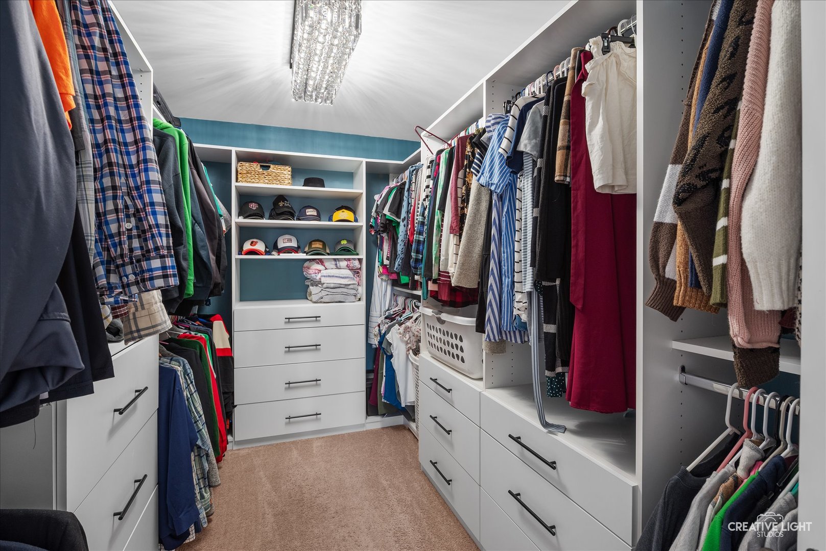 1615 Seward Road Joliet, IL 60431 - Photo 23 of 31 a view of walk in closet with clothes