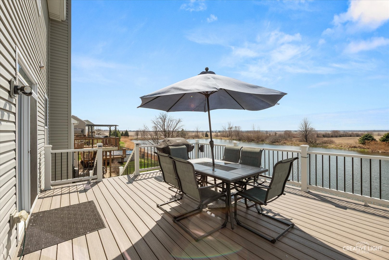 1615 Seward Road Joliet, IL 60431 - Photo 26 of 31 a view of a roof deck with table and chairs