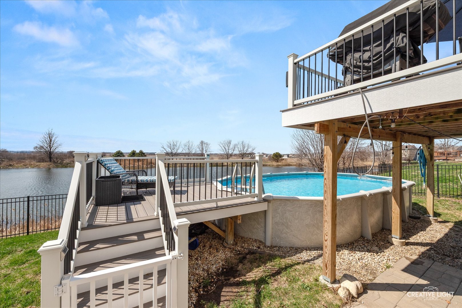 1615 Seward Road Joliet, IL 60431 - Photo 29 of 31 a view of a roof deck with a table and chairs