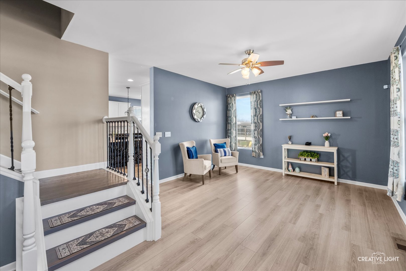 1615 Seward Road Joliet, IL 60431 - Photo 6 of 31 a living room with furniture and a wooden floor