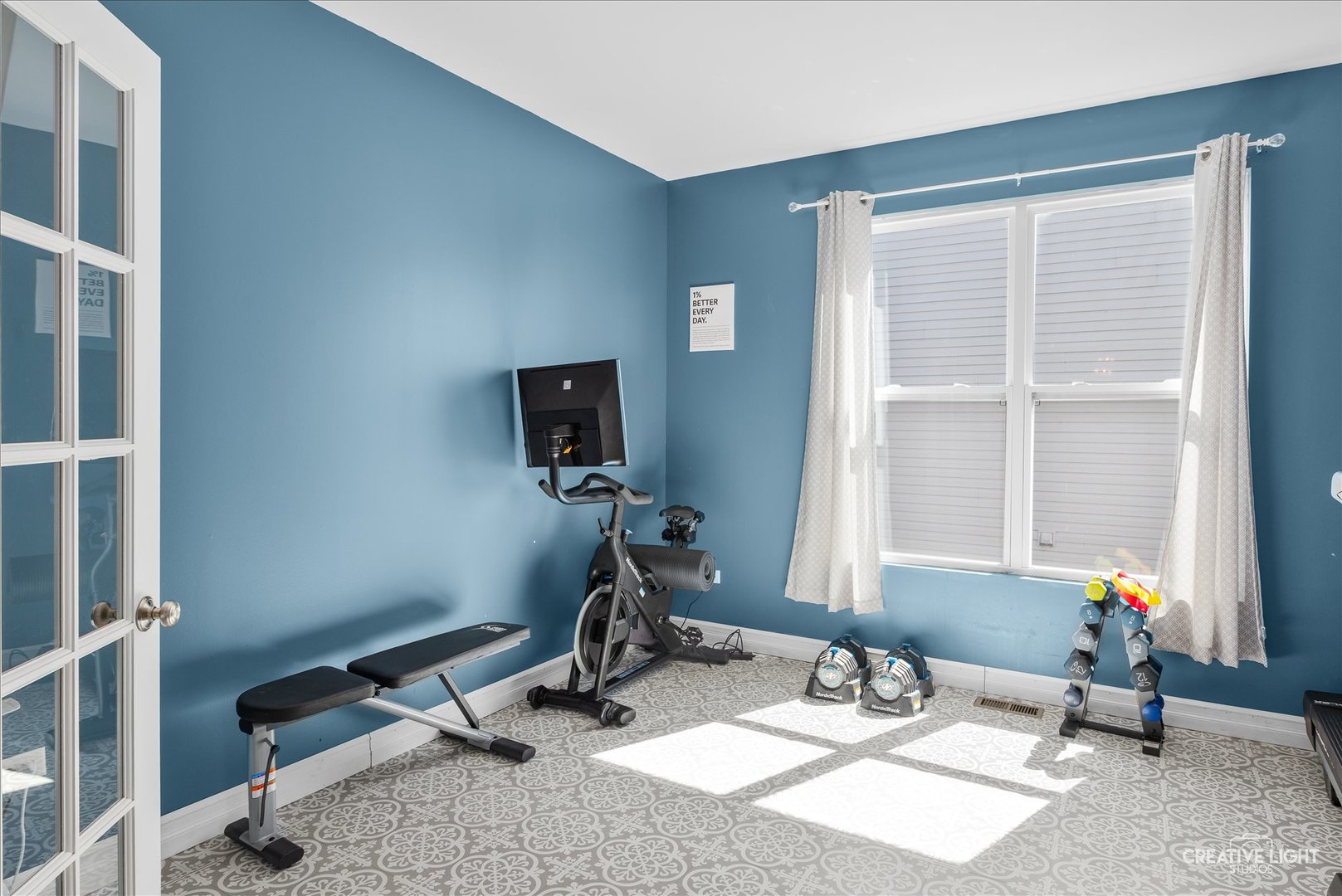 1615 Seward Road Joliet, IL 60431 - Photo 9 of 31 a room with gym equipment and a window