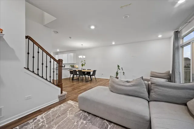 a living room with furniture and a table