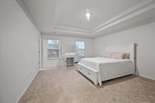 a room with a bed and a table