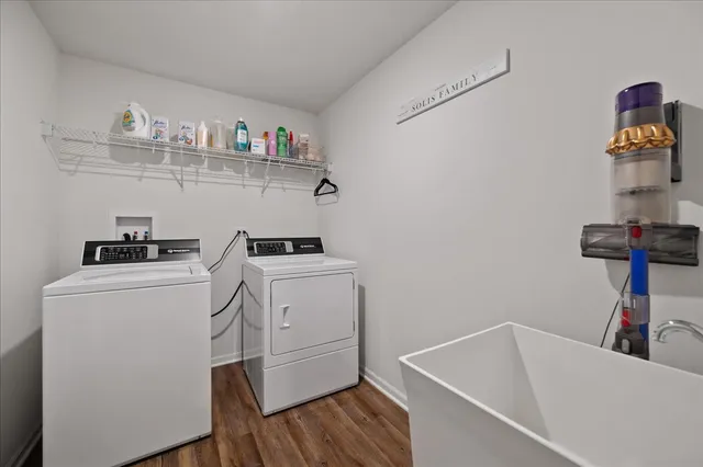 a view of storage and utility room with racks on the wall