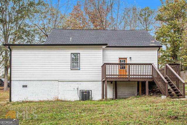 6236 Front Street Douglasville, GA 30134 - Photo 28 of 30 a view of a house with a yard