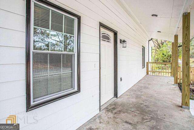 6236 Front Street Douglasville, GA 30134 - Photo 4 of 30 a view of front door and porch