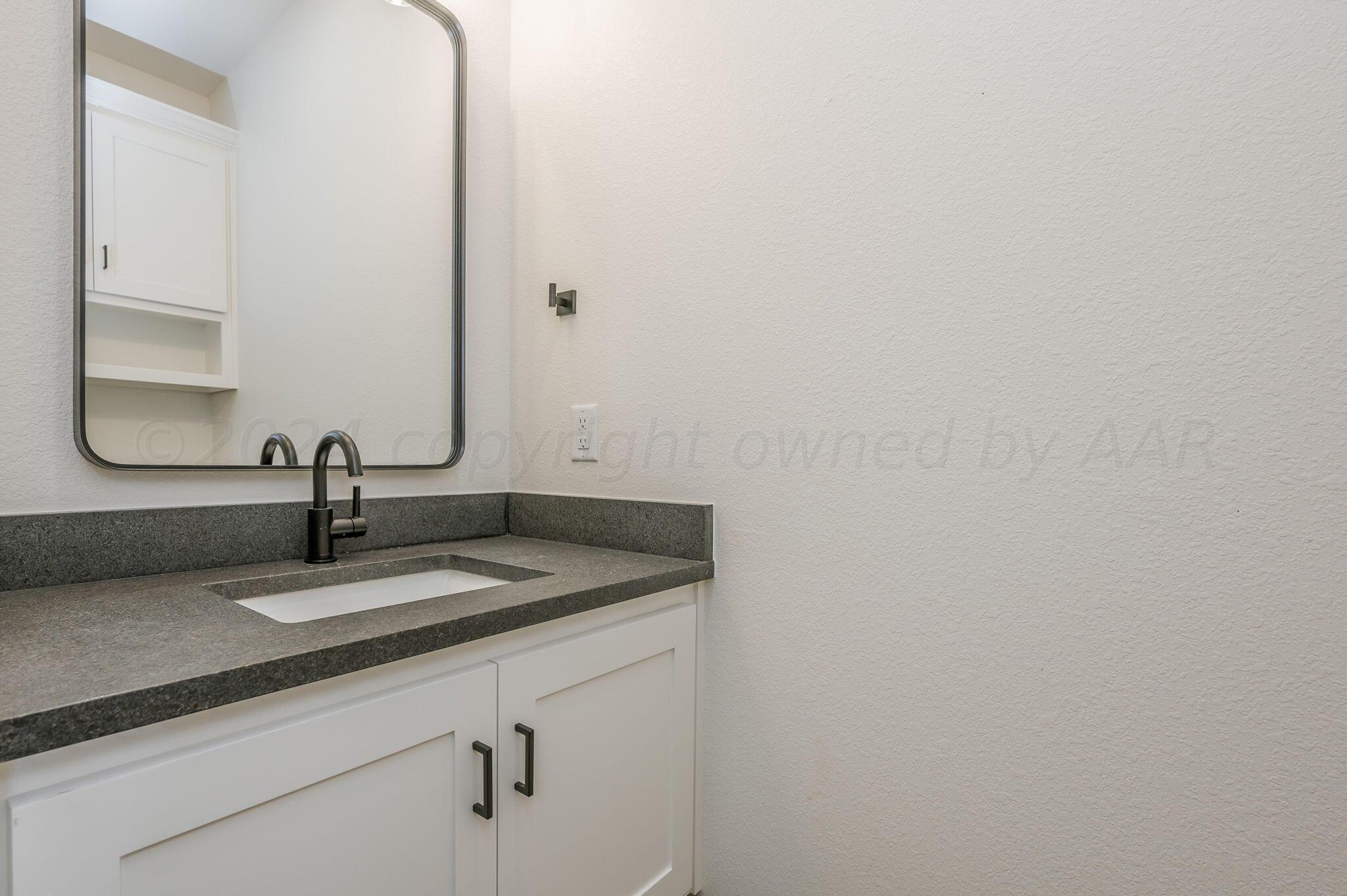26120 Newton Road Canyon, TX 79015 - Photo 17 of 28 Powder Room