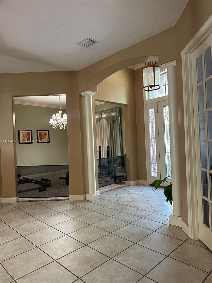 800 Permento Avenue Jacksonville, FL 32221 - Photo 21 of 29 a view of a hallway with wooden floor and furniture