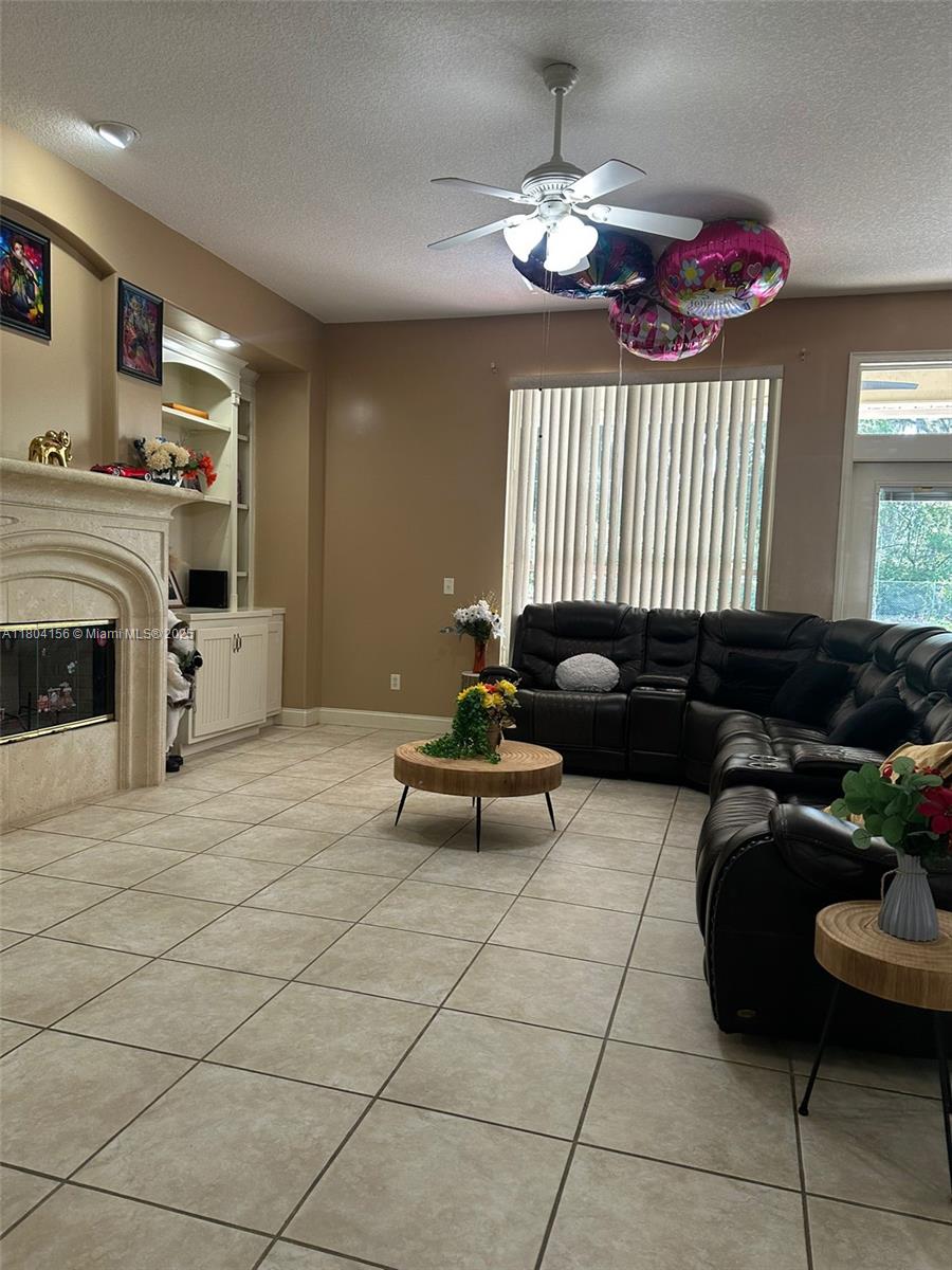 800 Permento Avenue Jacksonville, FL 32221 - Photo 22 of 29 a living room with furniture and a fireplace