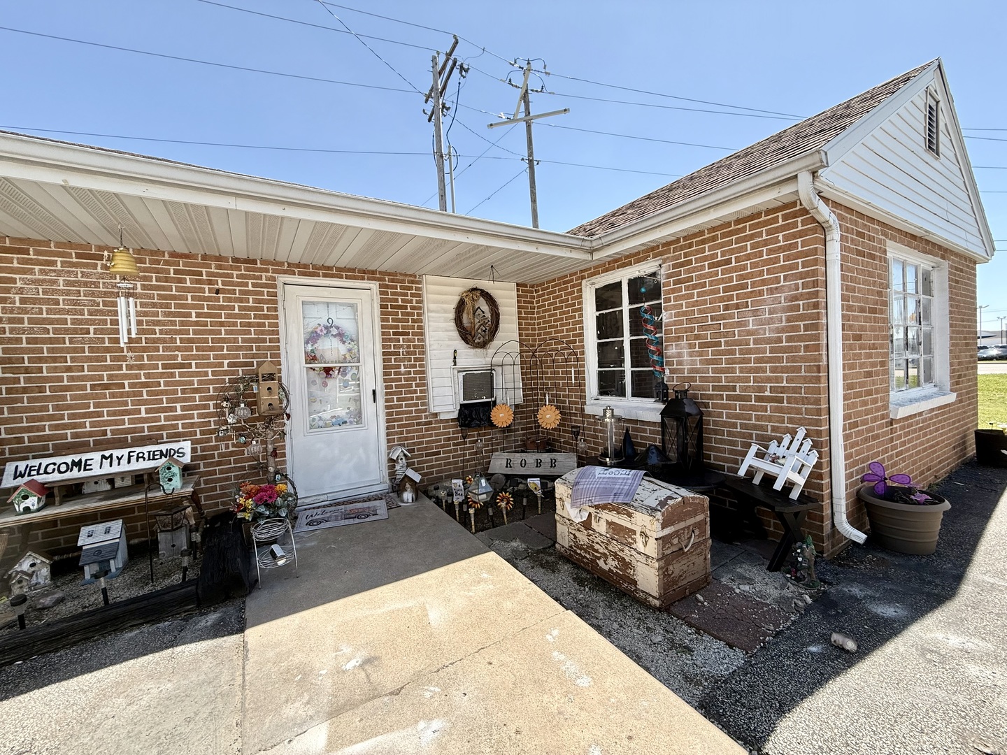 901 Highway 10 Clinton, IL 61727 - Photo 5 of 16 a living room with furniture windows and a fireplace