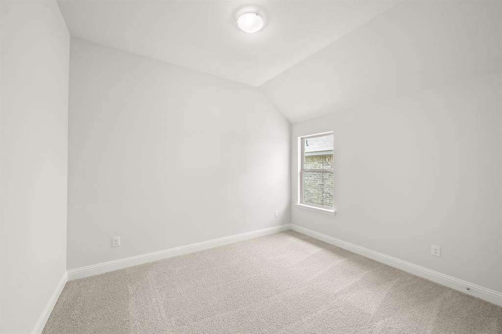 228 Shepards Street Godley, TX 76044 - Photo 21 of 27 an empty room with a window