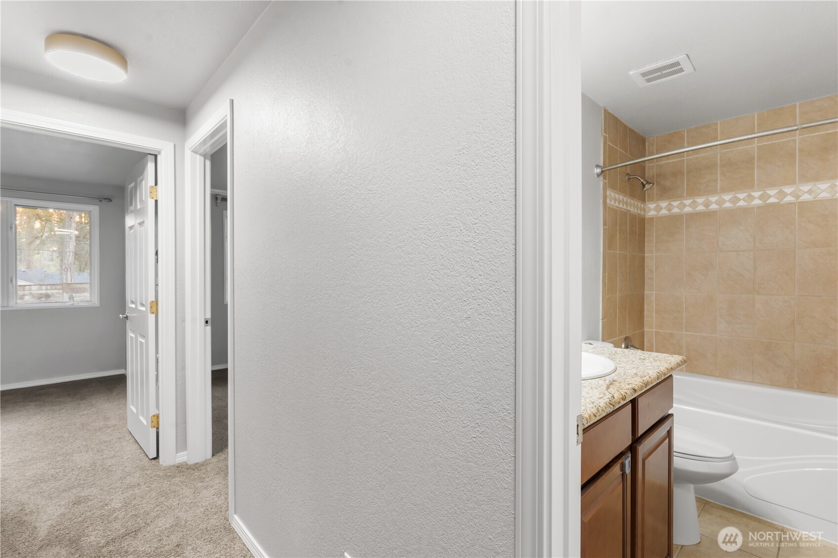 17303 Spanaway Loop Road South, Unit 2 Spanaway, WA 98387 - Photo 11 of 25 a view of walk in closet