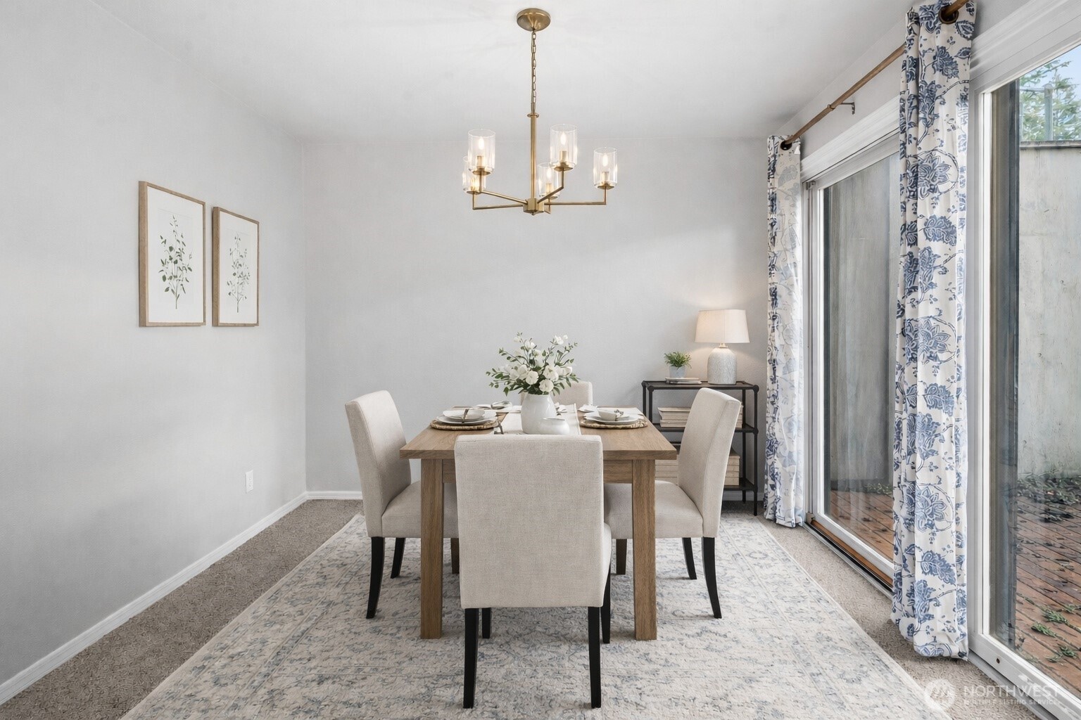 17303 Spanaway Loop Road South, Unit 2 Spanaway, WA 98387 - Photo 12 of 25 a view of a dining room with furniture window and wooden floor