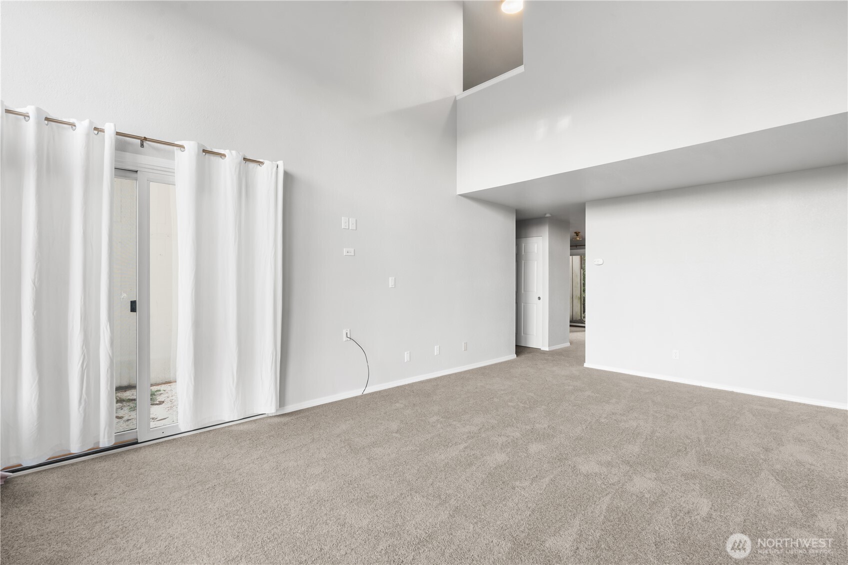 17303 Spanaway Loop Road South, Unit 2 Spanaway, WA 98387 - Photo 3 of 25 a view of an empty room with a window