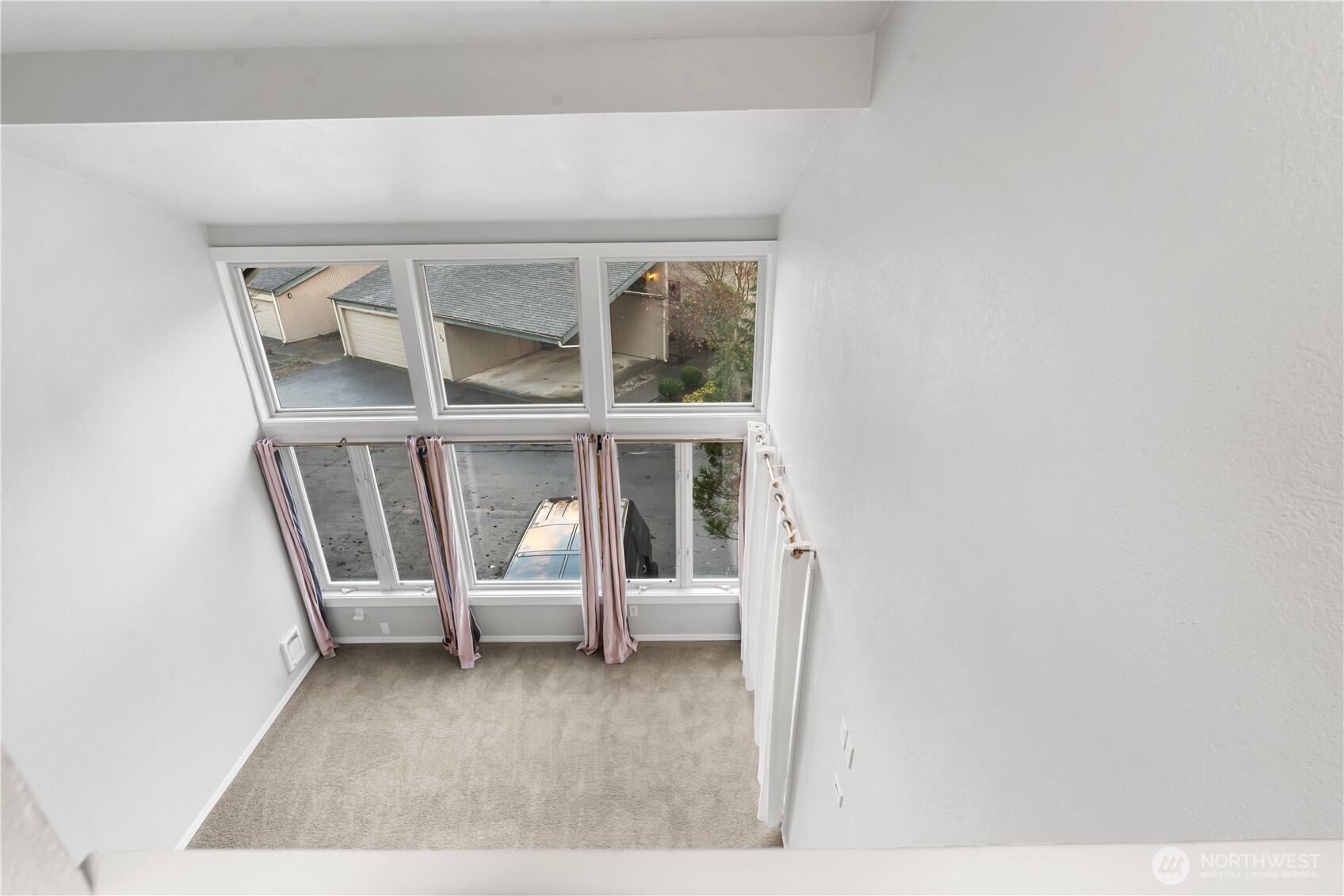 17303 Spanaway Loop Road South, Unit 2 Spanaway, WA 98387 - Photo 5 of 25 a view of a hardwood floor in a room