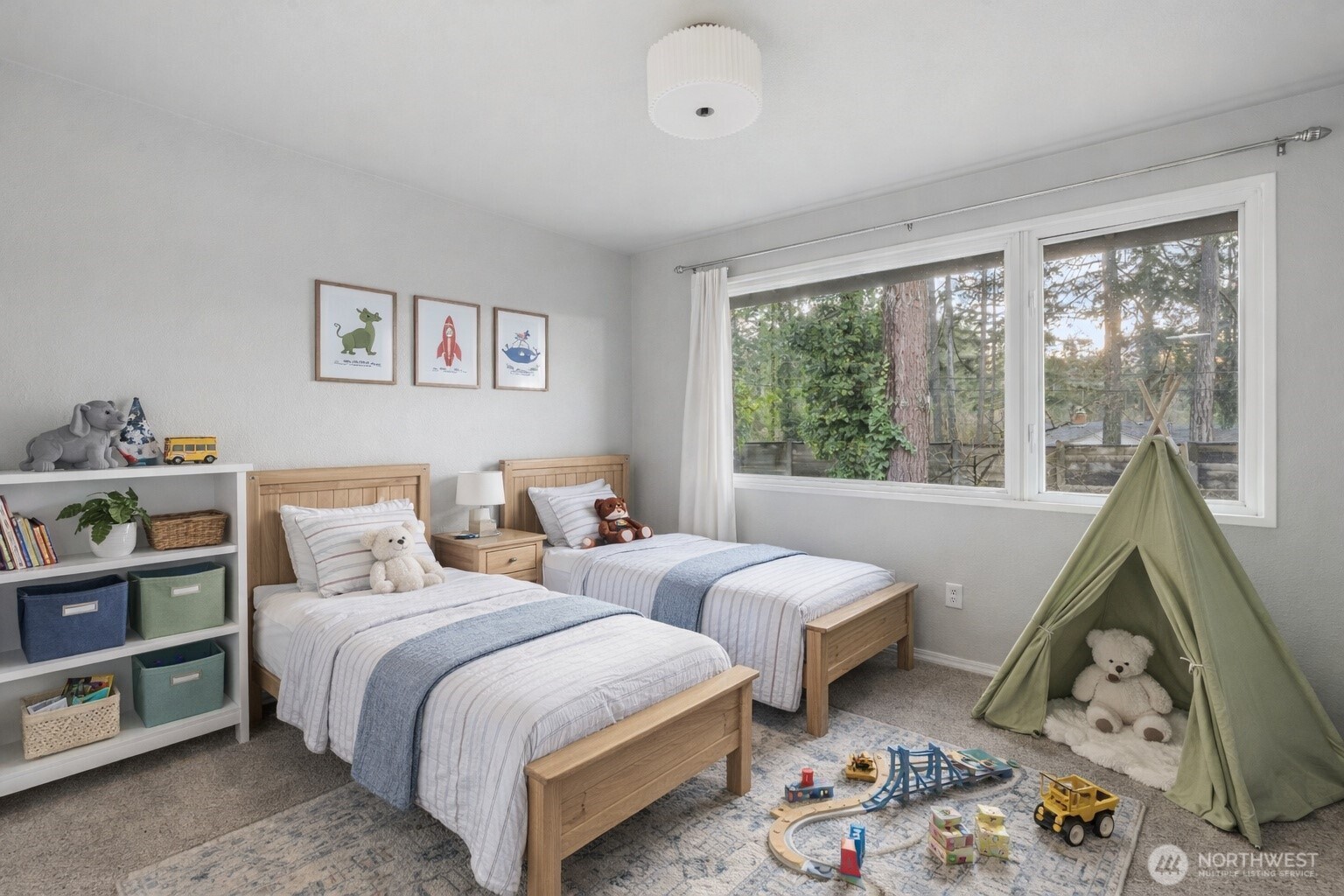 17303 Spanaway Loop Road South, Unit 2 Spanaway, WA 98387 - Photo 7 of 25 a bedroom with two beds and a large window